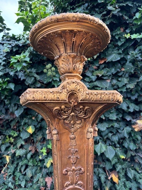 Large Torchère style Regence in gilt wood 19th century. Decorative torchère with openwork stem , decorated with ornaments , scrolls and tassels standing on 3 large scrolled legs.  Dimensions : Height : 166 cm Width : 62 cm Depth : 56 cm Torchère in good c