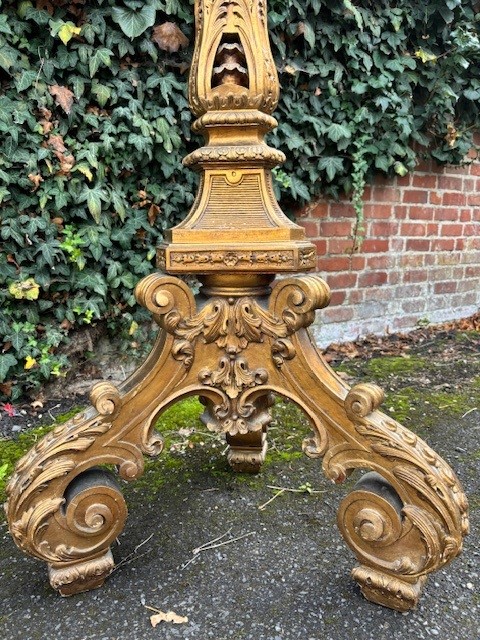 Large Torchère style Regence in gilt wood 19th century. Decorative torchère with openwork stem , decorated with ornaments , scrolls and tassels standing on 3 large scrolled legs.  Dimensions : Height : 166 cm Width : 62 cm Depth : 56 cm Torchère in good c