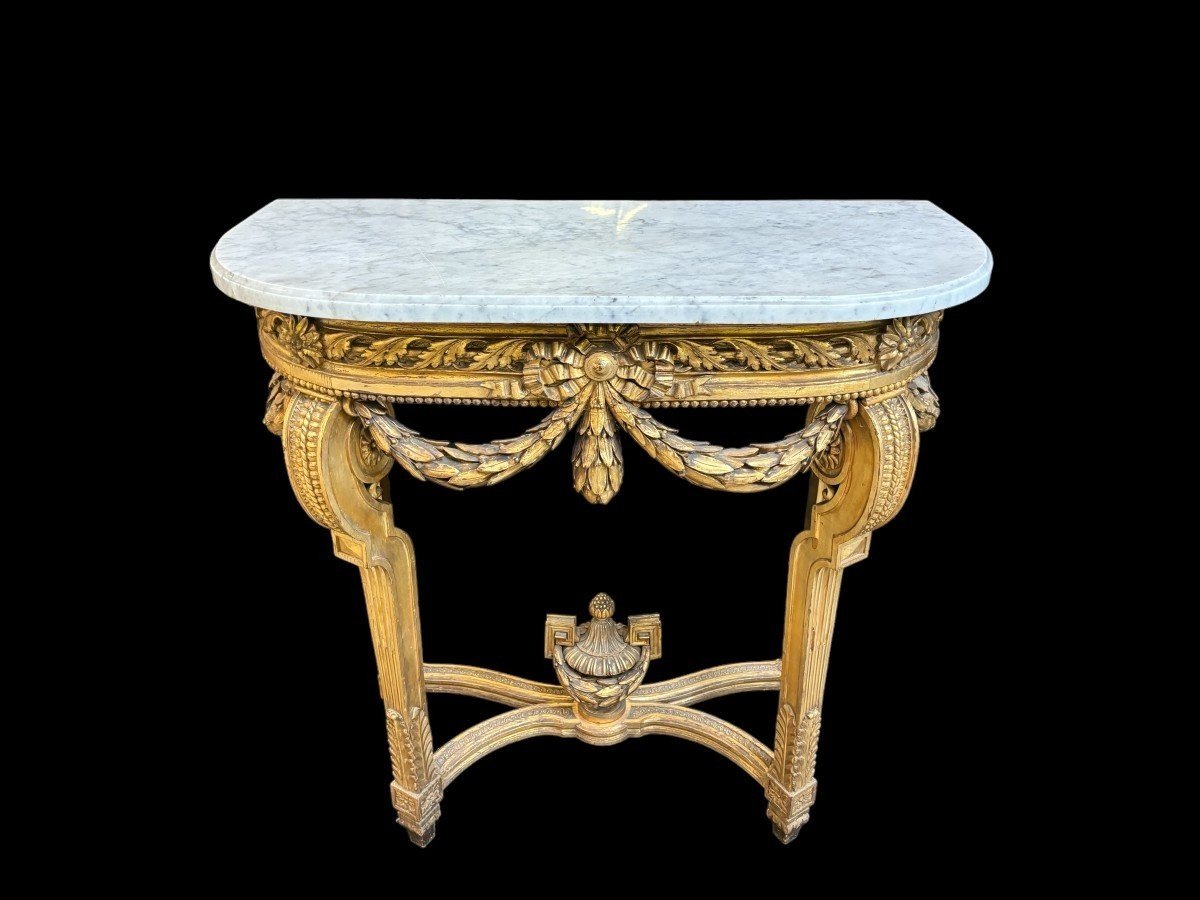 Nice console style Louis XVI in gilded wood 19th Century Decorative console with girlandes, ornamental vase and white marble top. Console and marble in good condition ( wooden girlande on the left side needs small restoration )