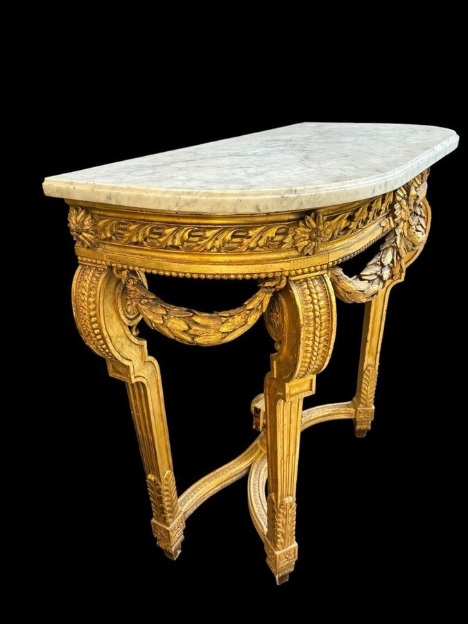 Nice console style Louis XVI in gilded wood 19th Century Decorative console with girlandes, ornamental vase and white marble top. Console and marble in good condition ( wooden girlande on the left side needs small restoration )