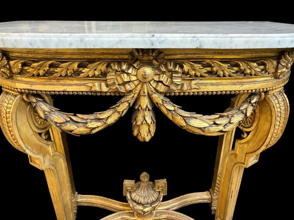 Nice console style Louis XVI in gilded wood 19th Century Decorative console with girlandes, ornamental vase and white marble top. Console and marble in good condition ( wooden girlande on the left side needs small restoration )