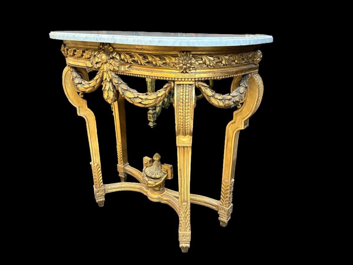 Nice console style Louis XVI in gilded wood 19th Century Decorative console with girlandes, ornamental vase and white marble top. Console and marble in good condition ( wooden girlande on the left side needs small restoration )