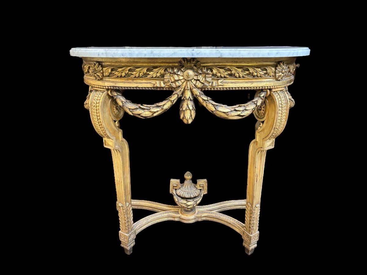 Nice console style Louis XVI in gilded wood 19th Century Decorative console with girlandes, ornamental vase and white marble top. Console and marble in good condition ( wooden girlande on the left side needs small restoration )