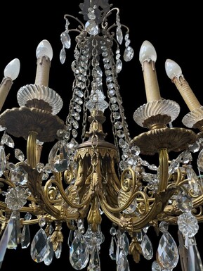 Nice, Late 19th Century LXVI Style Bronze/Crystal Chandelier. Bronze Frame Decorated With 10 Arms/Luminous Points, Bronze Decorative Elements, A Crystal Spike At The Top And Numerous Crystal Spokes. Dimensions: Height : 106 Cm Width : 80 Cm