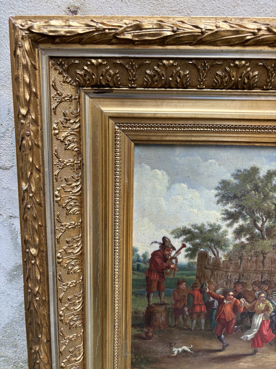 Nice painting ‘peasant village fete’ oil on panel 19th century Painting, signed, depicting a peasant village fete with people dancing and playing music against a landscape in the style of the 17th century. 