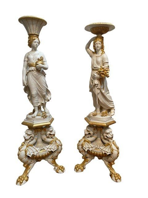 Pair of beautiful 19thc entury wooden pedestal sculptures. Very decorative female figures, finely carved in white with golden accents, resting on magnificent pedestals.