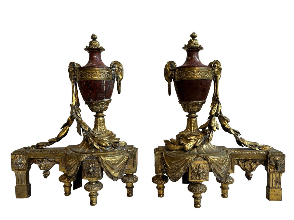 Pair of chenets Louis XVI style in gilt bronze and marble 19th century Beautiful pair of chenets with following dimensions : Height : 48 cm Width : 36 cm Depth : 19 cm In good condition , mid 19th century