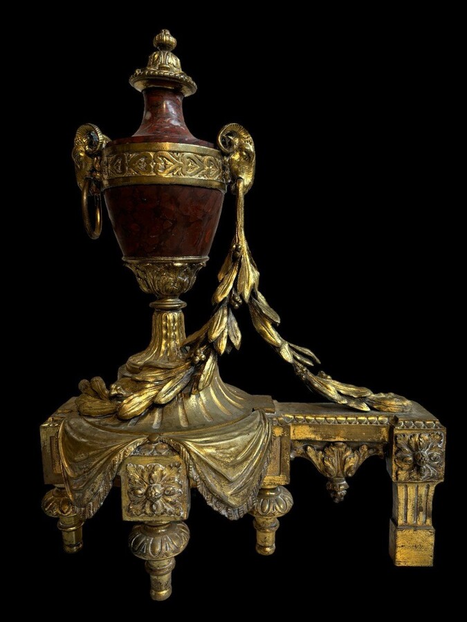 Pair of chenets Louis XVI style in gilt bronze and marble 19th century Beautiful pair of chenets with following dimensions : Height : 48 cm Width : 36 cm Depth : 19 cm In good condition , mid 19th century