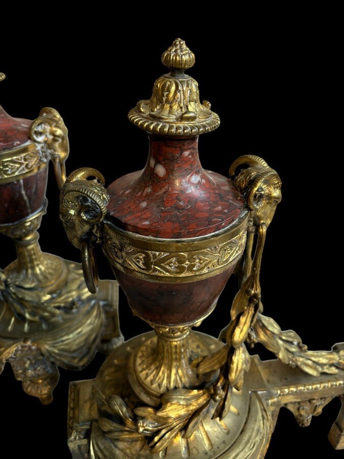 Pair of chenets Louis XVI style in gilt bronze and marble 19th century Beautiful pair of chenets with following dimensions : Height : 48 cm Width : 36 cm Depth : 19 cm In good condition , mid 19th century