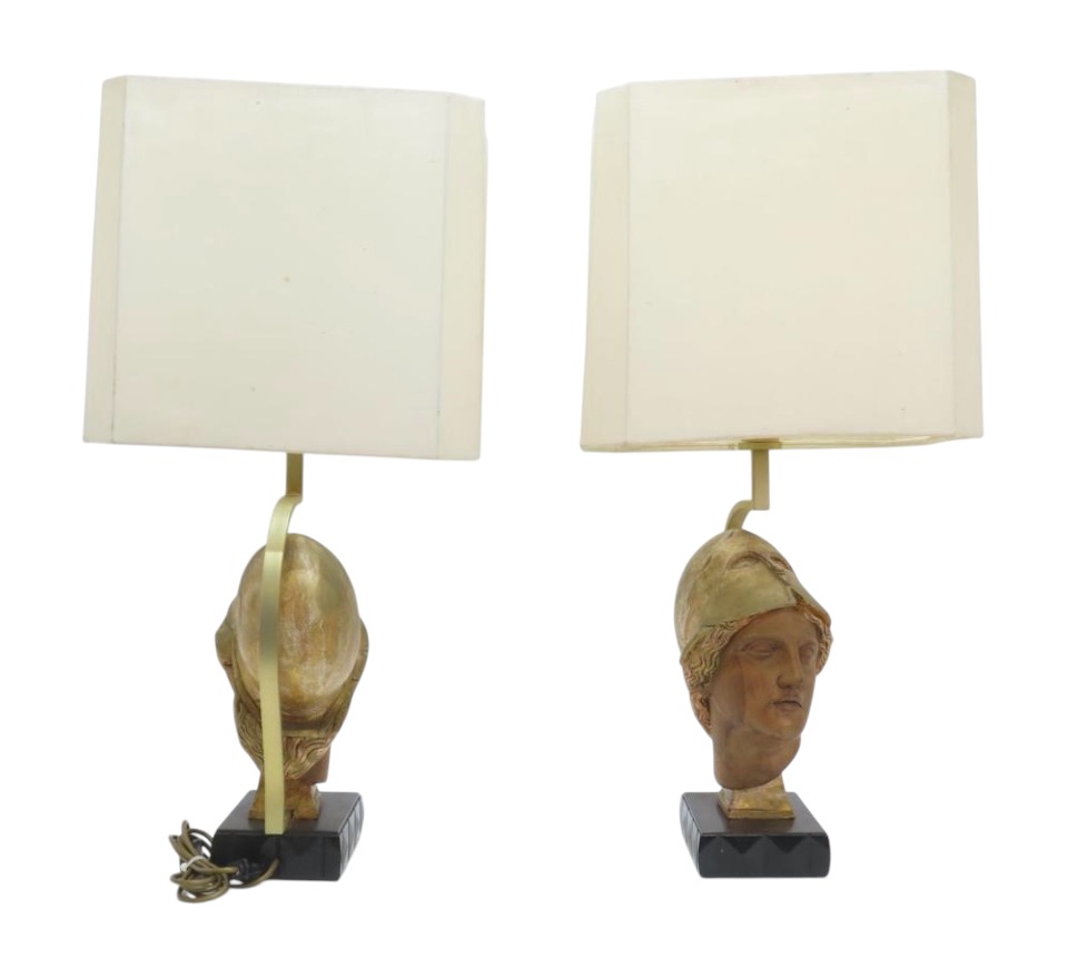 Pair of decorative lampadaires ‘ head of Athena ’ in wood 20th century Highly decorative lamp bases in wood with gold accents / copper standing on a black lacquer base in wood. 