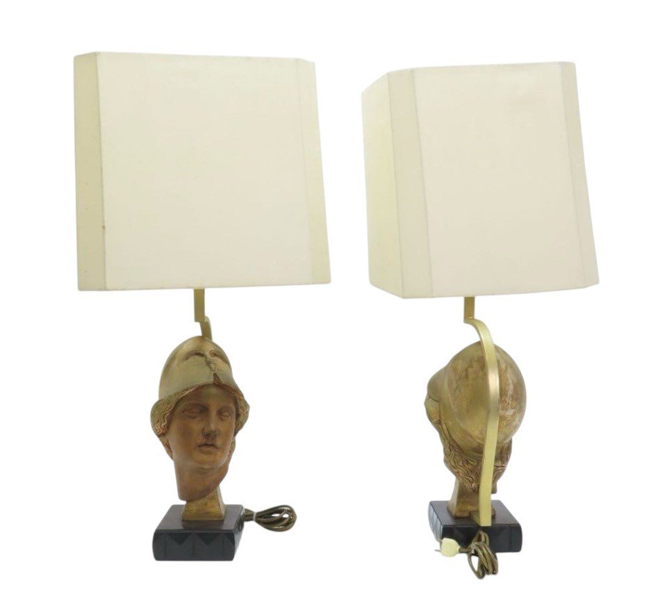 Pair of decorative lampadaires ‘ head of Athena ’ in wood 20th century Highly decorative lamp bases in wood with gold accents / copper standing on a black lacquer base in wood.