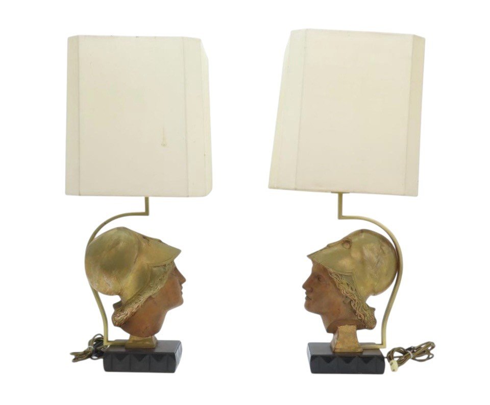 Pair of decorative lampadaires ‘ head of Athena ’ in wood 20th century Highly decorative lamp bases in wood with gold accents / copper standing on a black lacquer base in wood.