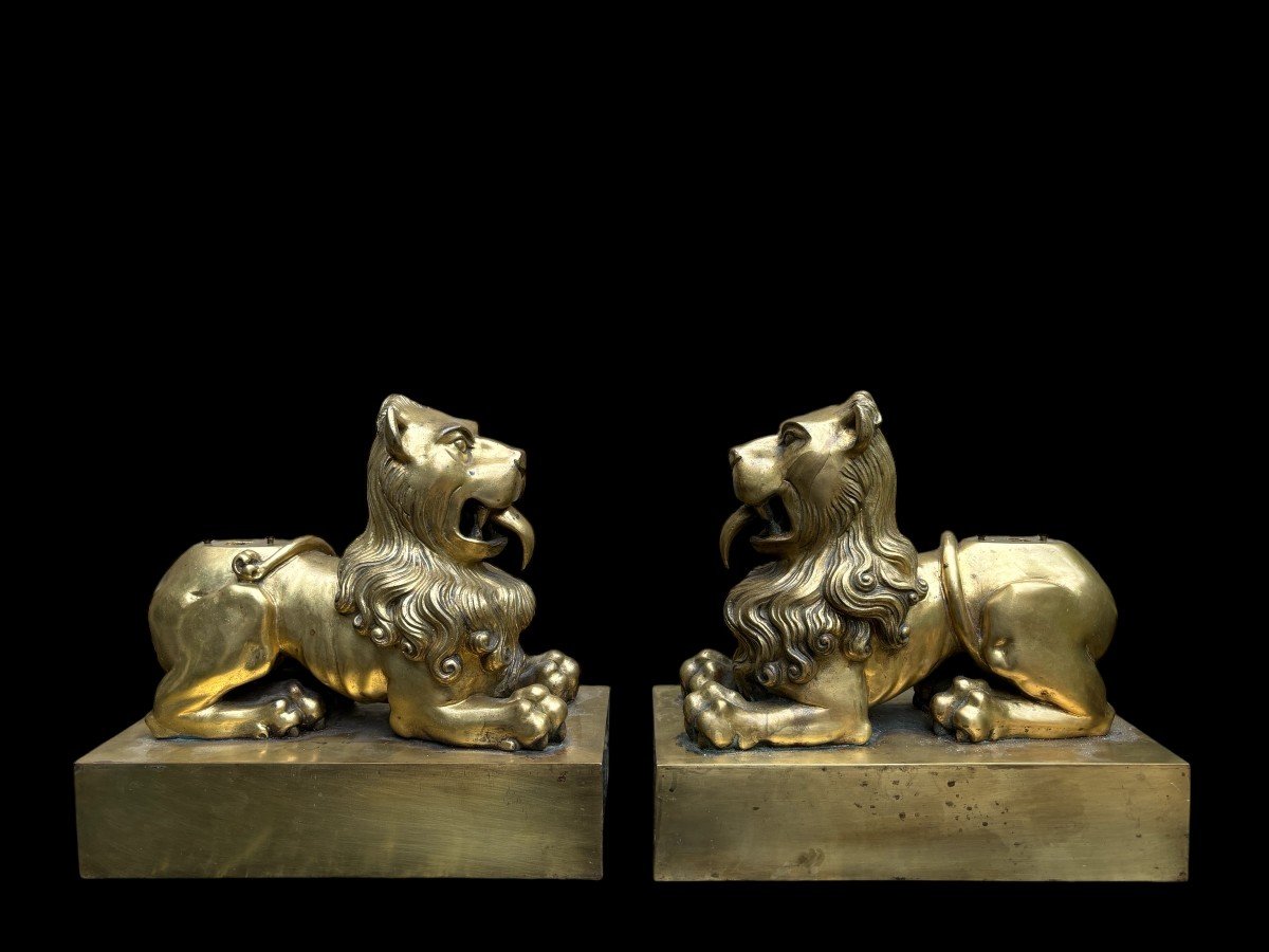 Pair of gilt bronze lions on plinth early 19th century. Very decorative lions formerly served as the leg of a very large candlestick or furniture. Very suitable to make them into beautiful lamp bases or just to put down as decorative objects.