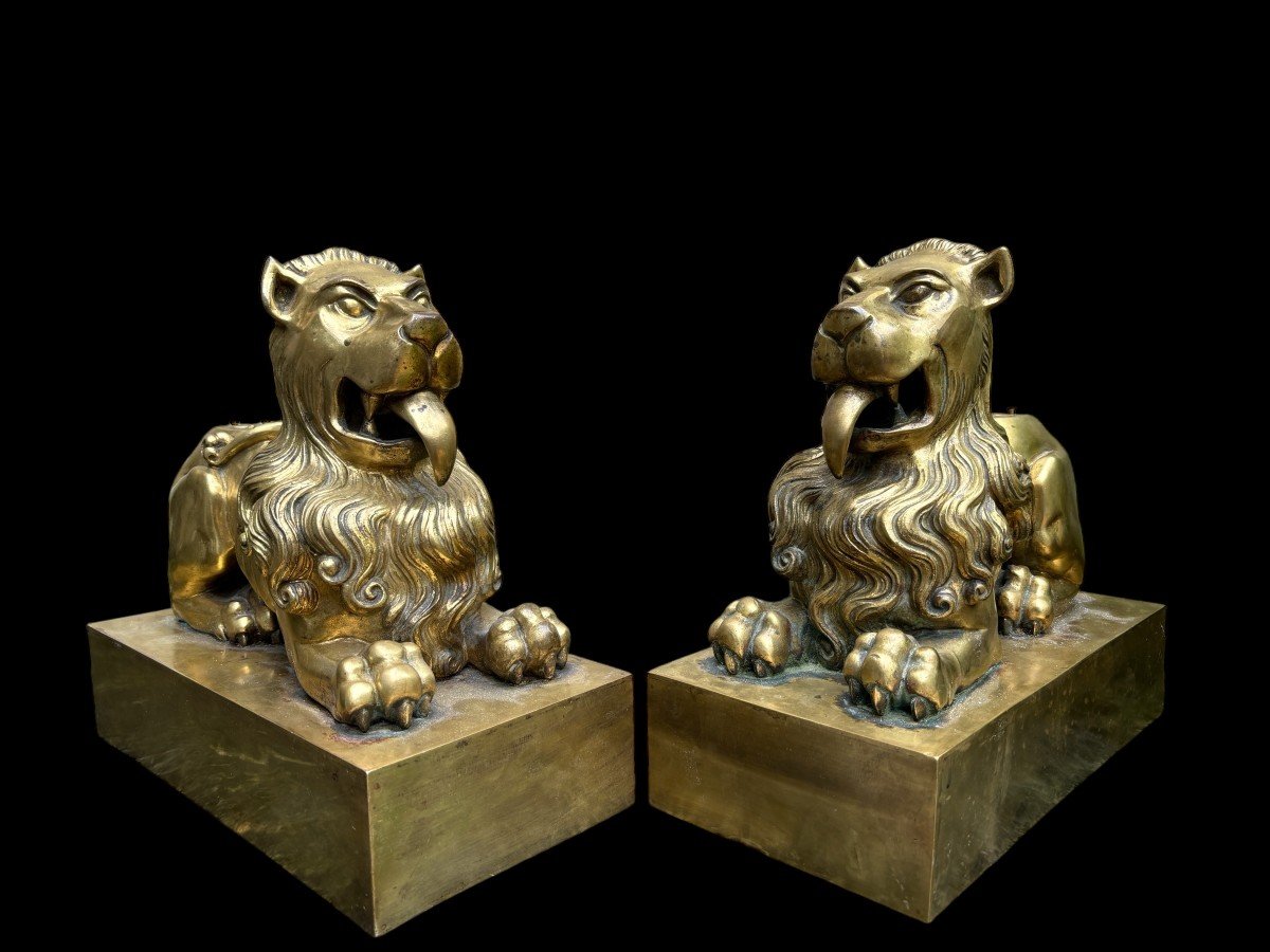 Pair of gilt bronze lions on plinth early 19th century. Very decorative lions formerly served as the leg of a very large candlestick or furniture. Very suitable to make them into beautiful lamp bases or just to put down as decorative objects.