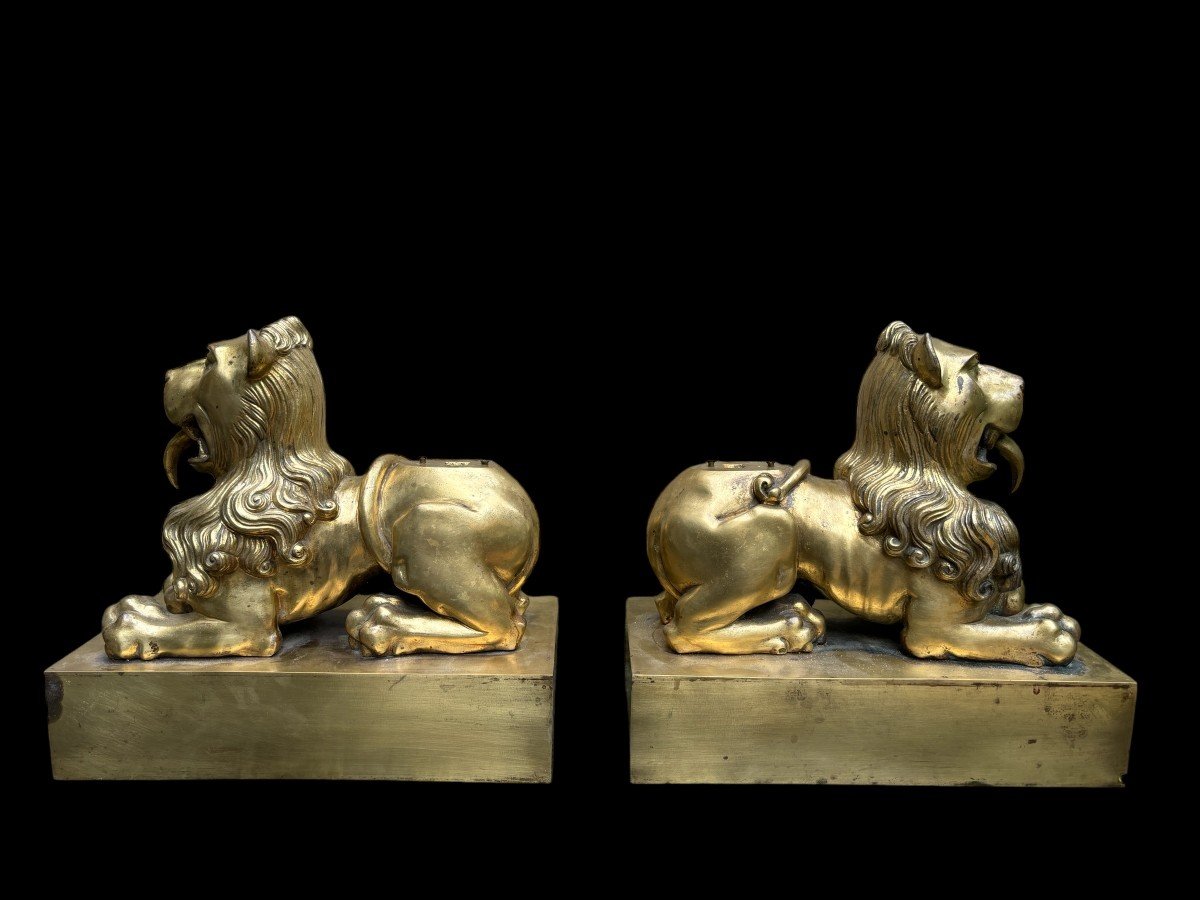 Pair of gilt bronze lions on plinth early 19th century. Very decorative lions formerly served as the leg of a very large candlestick or furniture. Very suitable to make them into beautiful lamp bases or just to put down as decorative objects.