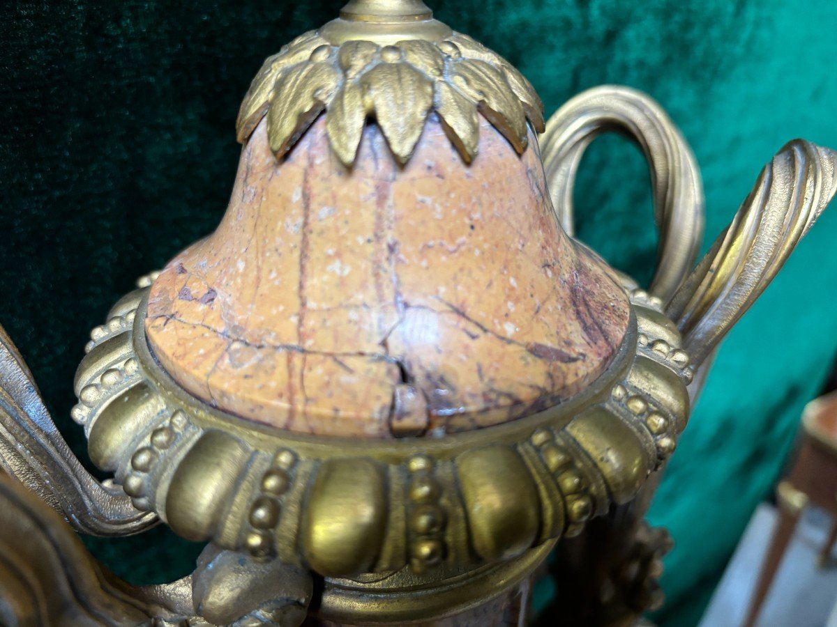 Pair of large castle vases in marble and gilt bronze 19thC. ( 80 cm ) Vases of very high quality with a height of 80 cm! In good condition with some flaws ( 1 lid needs restoration and 1 piece of bronze is missing ). Dimensions : Height : 80 cm 