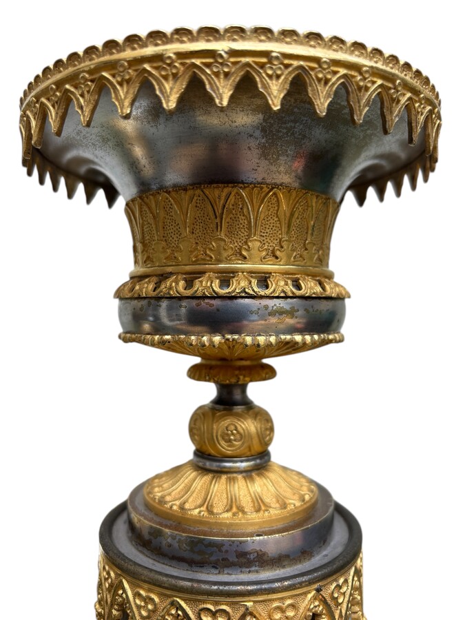 Pair of large cathedral style cassolettes in gilded bronze with mercury and silverplated patina from the Charles X period, early 19th century. Octagonal base which gives them a lot of character, a wide neck for opulence. 