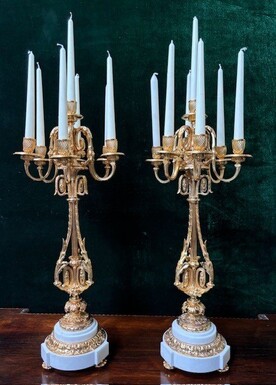 Pair of large gilt bronze candlesticks Napoleon III Very elegant candlesticks with 7 candleholders , decorated with ornaments and resting on a gilt bronze / white marble base Dimensions : Height : 74 cm Width : 31 cm Both are in very good condition