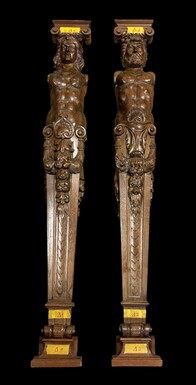 Pair of large Karyatids in walnut late 19th century. Highly decorative karyatids in very finely sculpted walnut depicting a woman and a man  Capitals and base at bottom are separate elements. Both in very good condition. Dimensions : Height : 140 cm Width