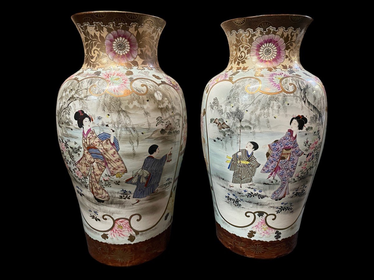 Pair of large porcelain vases Japan early 20th century ( 62 cm ). Vases in coloured porcelain with images of characters, ornaments, water and flora. Both are in very good condition with the following dimensions: Height: 62 cm Width: 34 cm