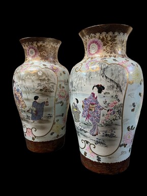 Pair of large porcelain vases Japan early 20th century ( 62 cm ). Vases in coloured porcelain with images of characters, ornaments, water and flora. Both are in very good condition with the following dimensions: Height: 62 cm Width: 34 cm