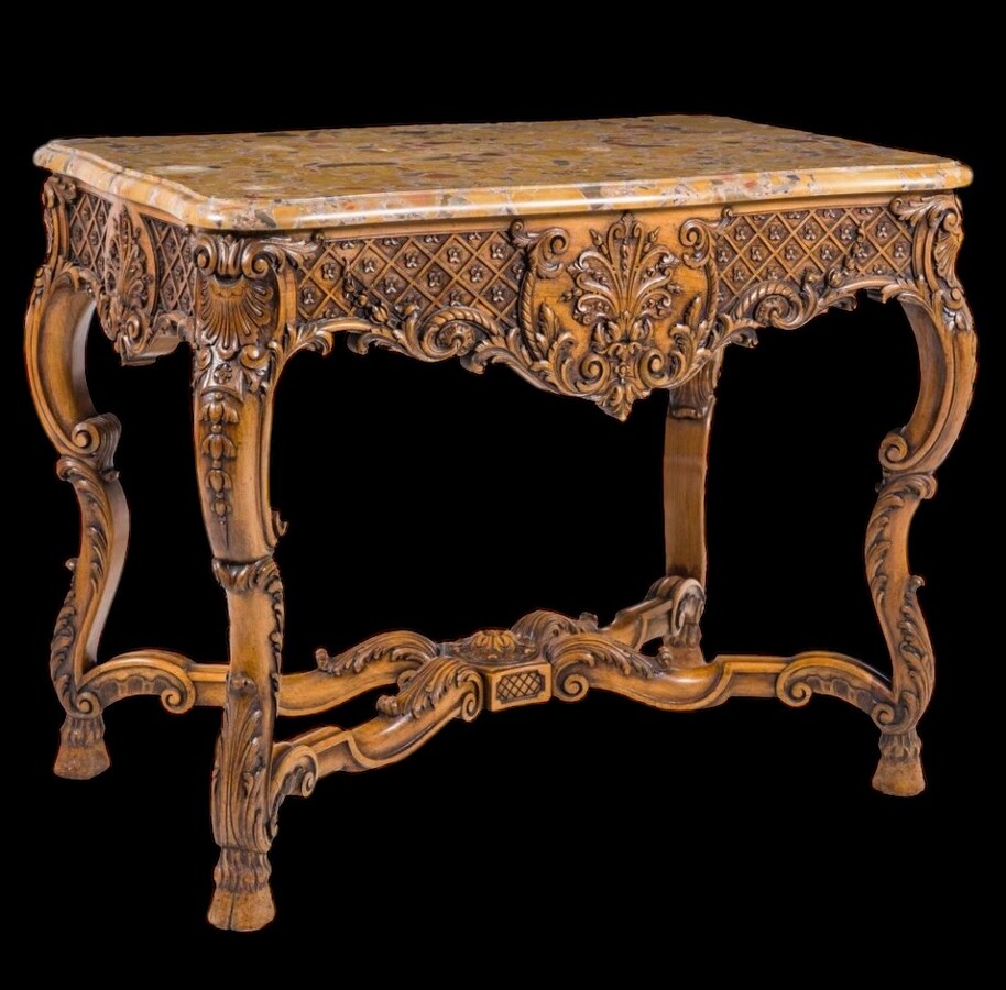 Richly carved wooden centre table with marble top Circa 1920 Attractive oak central table /console topped with Breche d'Alep marble Dimensions: Height: 80 cm.  Width : 100 cm.  Depth : 60 cm. In very good condition