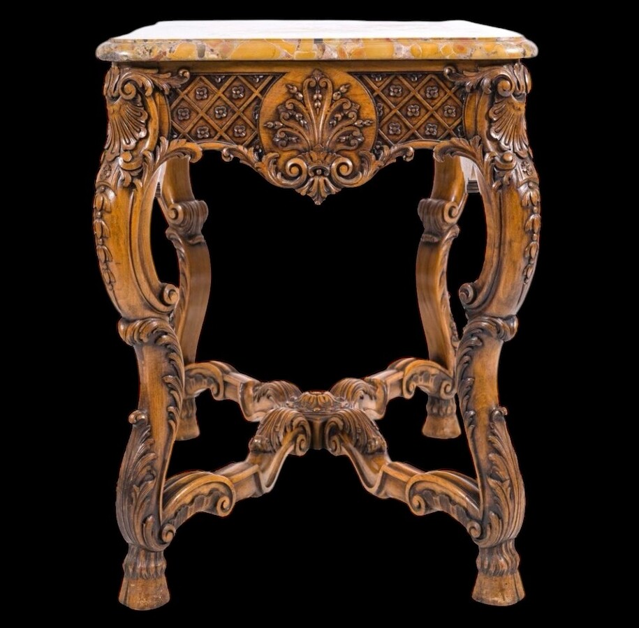 Richly carved wooden centre table with marble top Circa 1920 Attractive oak central table /console topped with Breche d'Alep marble Dimensions: Height: 80 cm.  Width : 100 cm.  Depth : 60 cm. In very good condition