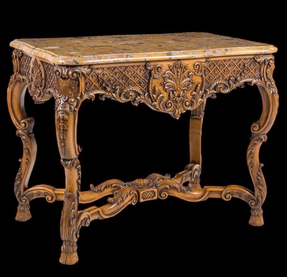 Richly carved wooden centre table with marble top Circa 1920 Attractive oak central table /console topped with Breche d'Alep marble Dimensions: Height: 80 cm. Width : 100 cm. Depth : 60 cm. In very good condition