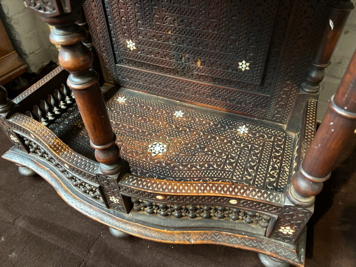 Sculpted furniture with inlays of ebony and mother-of-pearl. Syria , early 19th century. Furniture in used condition , consists of 2 parts with some missing pieces of wood Dimensions : Height : 234 cm Width : 86 cm Depth : 30 / 48 cm