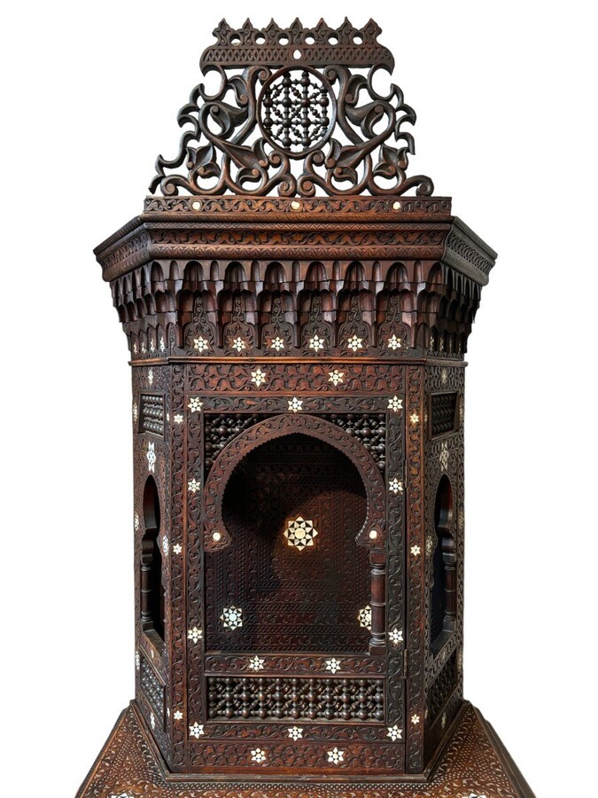 Sculpted furniture with inlays of ebony and mother-of-pearl. Syria , early 19th century. Furniture in used condition , consists of 2 parts with some missing pieces of wood Dimensions : Height : 234 cm Width : 86 cm Depth : 30 / 48 cm