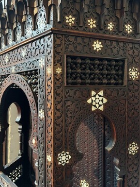 Sculpted furniture with inlays of ebony and mother-of-pearl. Syria , early 19th century. Furniture in used condition , consists of 2 parts with some missing pieces of wood Dimensions : Height : 234 cm Width : 86 cm Depth : 30 / 48 cm