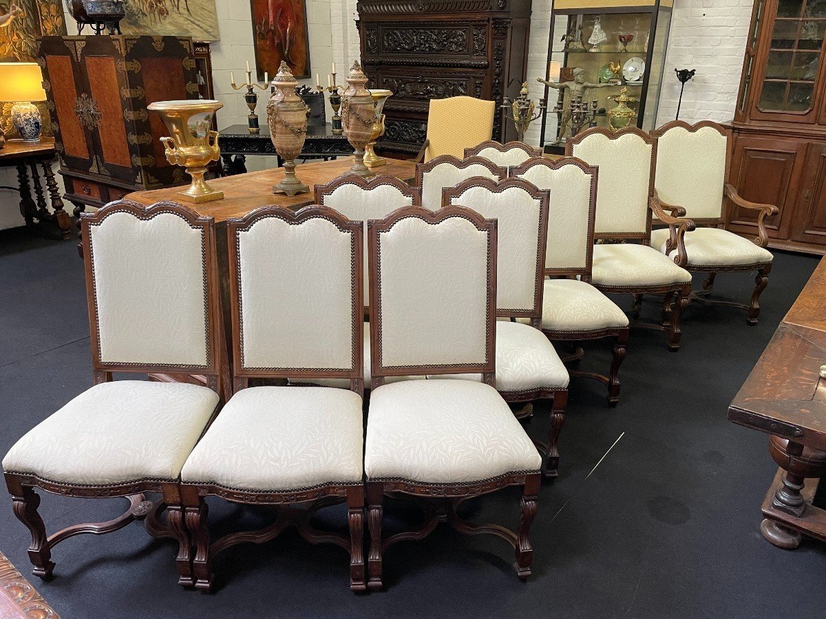 Set of 10 chairs style Régence in walnut 1900 Beautiful set of 8 chairs + 2 armchairs in walnut with fabric upholstery. Height : 107 ( 8x ) / 114 ( 2x ) Width : 52 / 62 cm Depth : 50 / 55 cm The set in good condition and from around 1900-1920