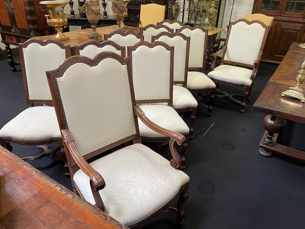 Set of 10 chairs style Régence in walnut 1900 Beautiful set of 8 chairs + 2 armchairs in walnut with fabric upholstery. Height : 107 ( 8x ) / 114 ( 2x ) Width : 52 / 62 cm Depth : 50 / 55 cm The set in good condition and from around 1900-1920