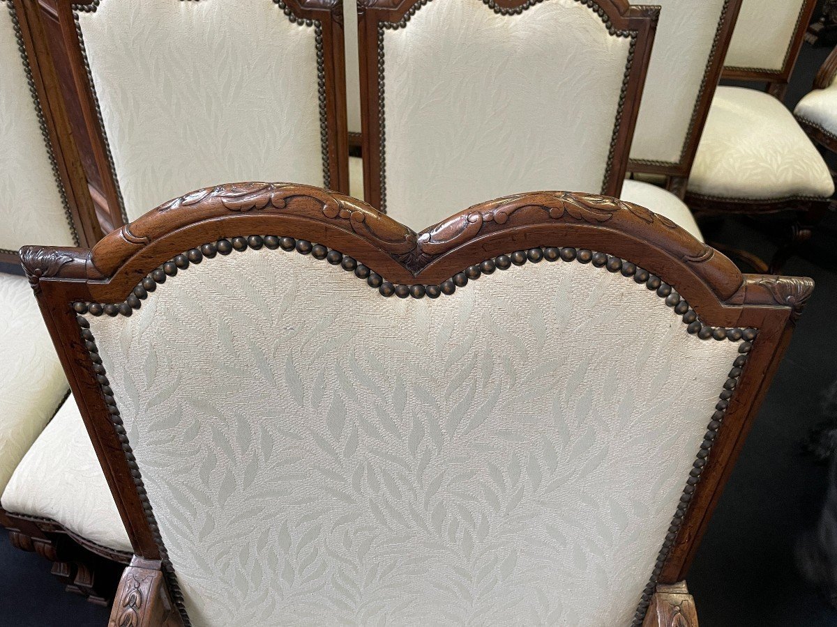 Set of 10 chairs style Régence in walnut 1900 Beautiful set of 8 chairs + 2 armchairs in walnut with fabric upholstery. Height : 107 ( 8x ) / 114 ( 2x ) Width : 52 / 62 cm Depth : 50 / 55 cm The set in good condition and from around 1900-1920