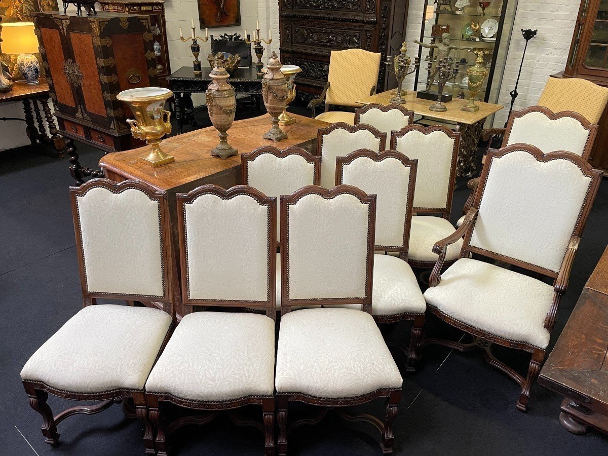 Set of 10 chairs style Régence in walnut 1900 Beautiful set of 8 chairs + 2 armchairs in walnut with fabric upholstery. Height : 107 ( 8x ) / 114 ( 2x ) Width : 52 / 62 cm Depth : 50 / 55 cm The set in good condition and from around 1900-1920