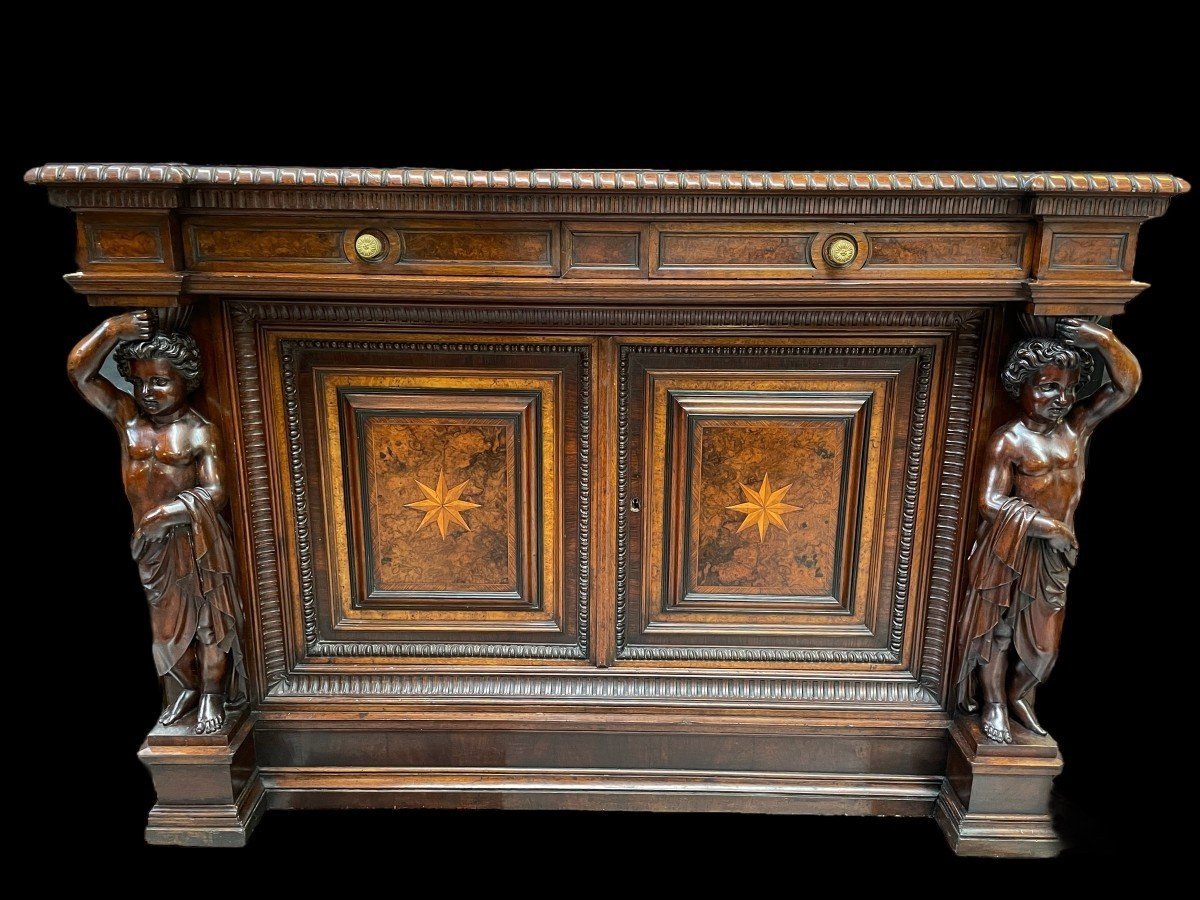 Special cabinet with 2 large sculptures in walnut 19th century. Beautiful cabinet with a distinct shape ( corner ) fitted with 2 doors and 2 drawers , 2 finely carved sculptures and inlaid marquetry in the doors. Locks in the drawers are missing.