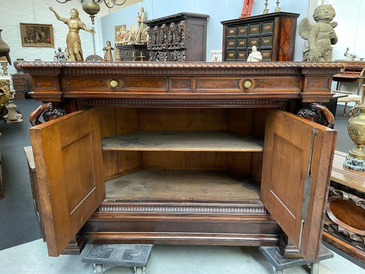 Special cabinet with 2 large sculptures in walnut 19th century. Beautiful cabinet with a distinct shape ( corner ) fitted with 2 doors and 2 drawers , 2 finely carved sculptures and inlaid marquetry in the doors. Locks in the drawers are missing.