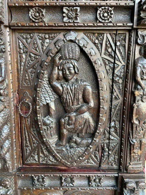 Special Scottish Furniture In Renaissance Style 19th Century. Decorative Oak Cabinet With 2 Doors, All Kinds Of Carvings, Medallions And Decorations. Scottish Cabinet Circa 1800-1820 In Good Condition With Normal Signs Of Use.